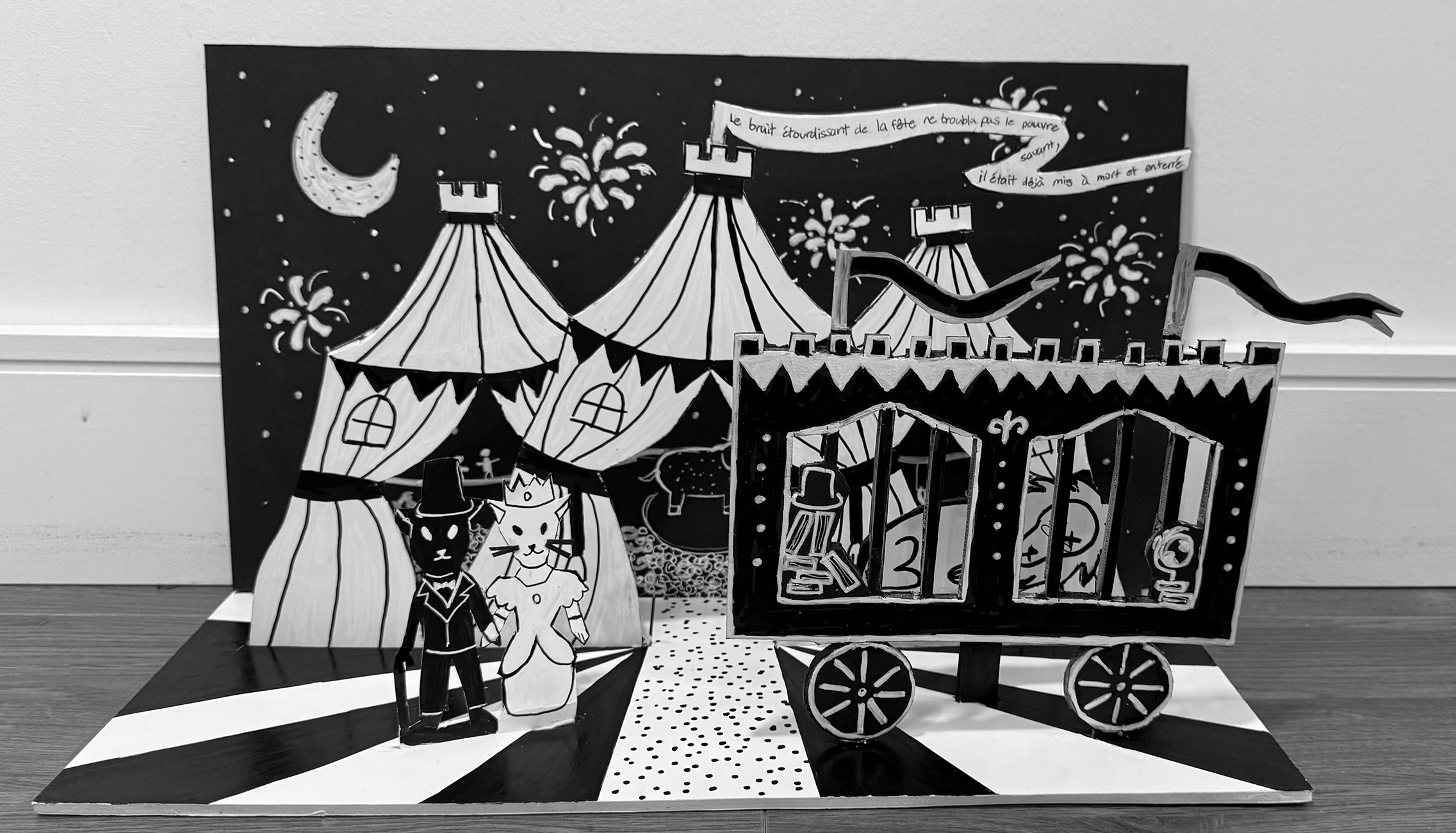 White book with red slanted lines on a brown coffee table